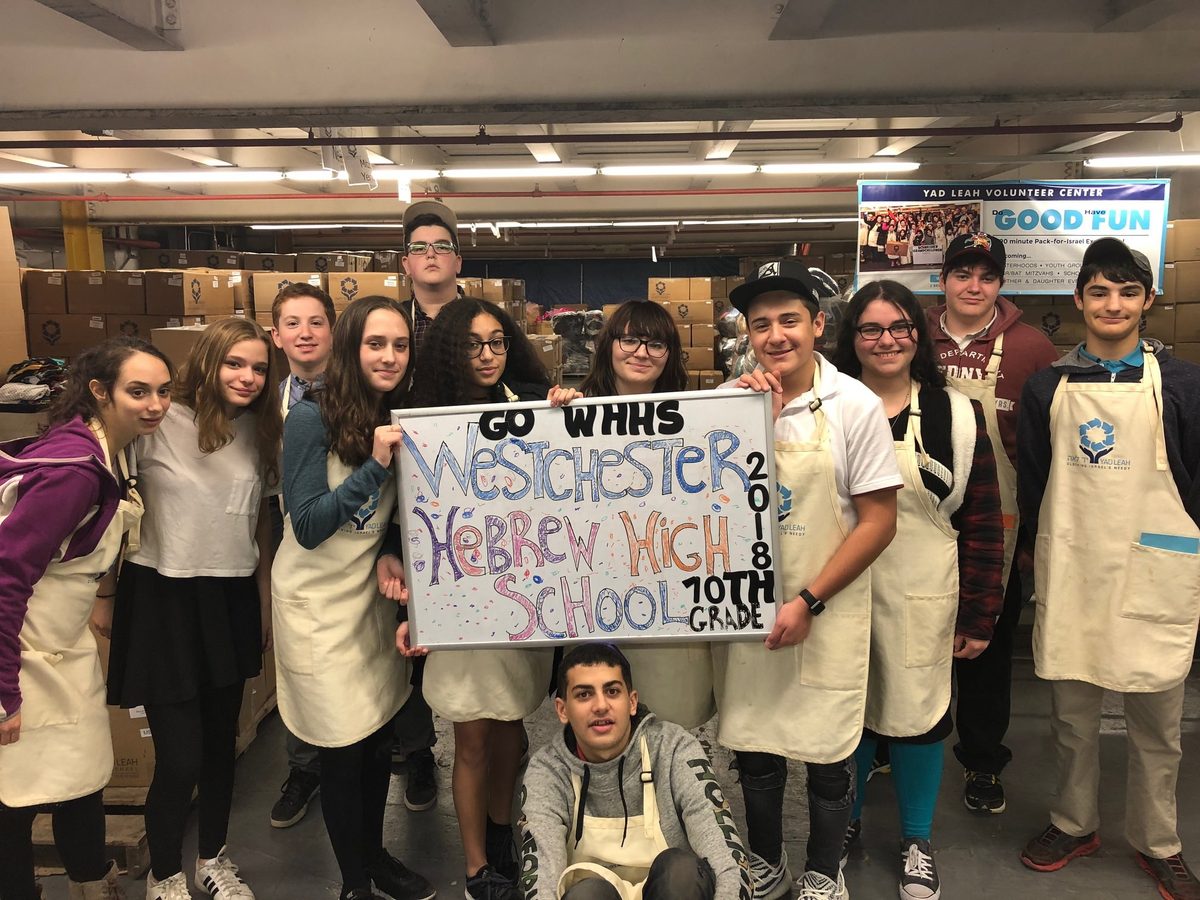 WHHS 10th graders volunteering at a food pantry